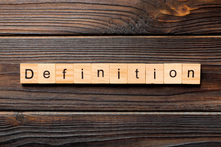 Definition word written on wood block. Definition text on wooden table for your desing, concept