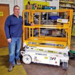 Advantage Rentals owner with Zero Turn Lift